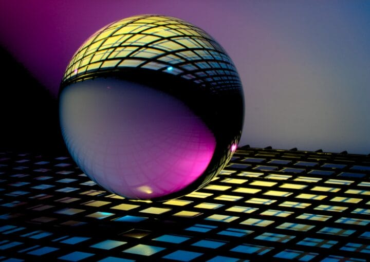 blue and black ball on blue and white checkered textile