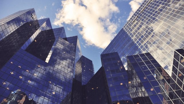 low angle photo of curtain wall building