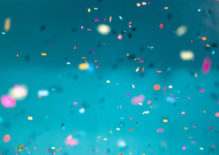 selective focus photography of multicolored confetti lot